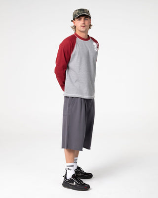Man wearing Shadow Waffle Long Sleeve Tee in Grey Marle