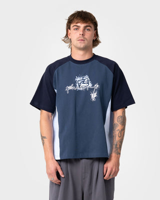 Man wearing Splish Splash Short Sleeve Tee in China Blue