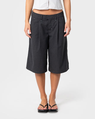 Woman wearing Road Rage Finance Mommy Low Rise Short in Coal Pinstripe