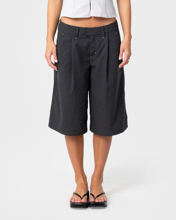 woman-wearing-road-rage-finance-mommy-low-rise-short-in-coal-pinstripe