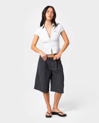Woman wearing Road Rage Finance Mommy Low Rise Short in Coal Pinstripe