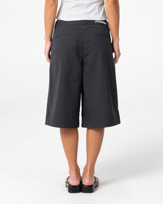 Woman wearing Road Rage Finance Mommy Low Rise Short in Coal Pinstripe