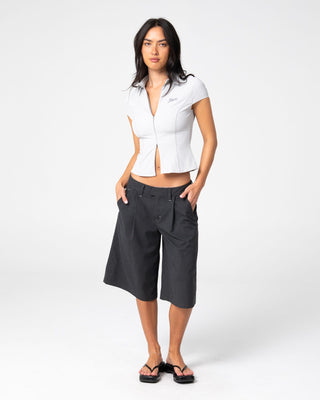 Woman wearing Road Rage Finance Mommy Low Rise Short in Coal Pinstripe