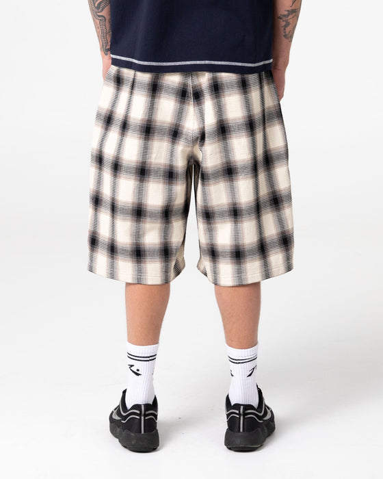 man-wearing-mista-checkya-elastic-short-in-pinecone