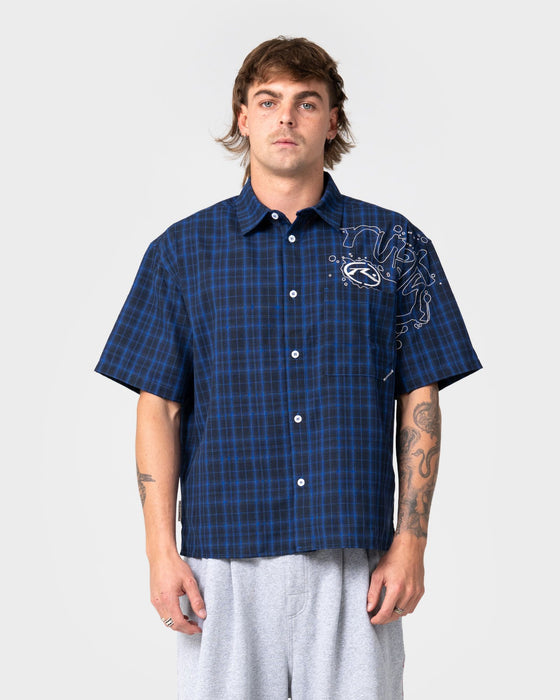 man-wearing-slick-rick-short-sleeve-shirt-in-royal-blue