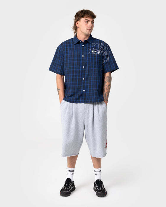 man-wearing-slick-rick-short-sleeve-shirt-in-royal-blue