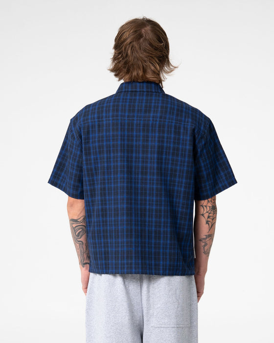 man-wearing-slick-rick-short-sleeve-shirt-in-royal-blue