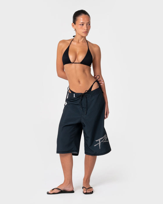 woman-wearing-hailey-fixed-waist-boardshort-in-black-pinstripe
