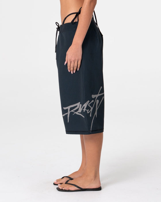 woman-wearing-hailey-fixed-waist-boardshort-in-black-pinstripe