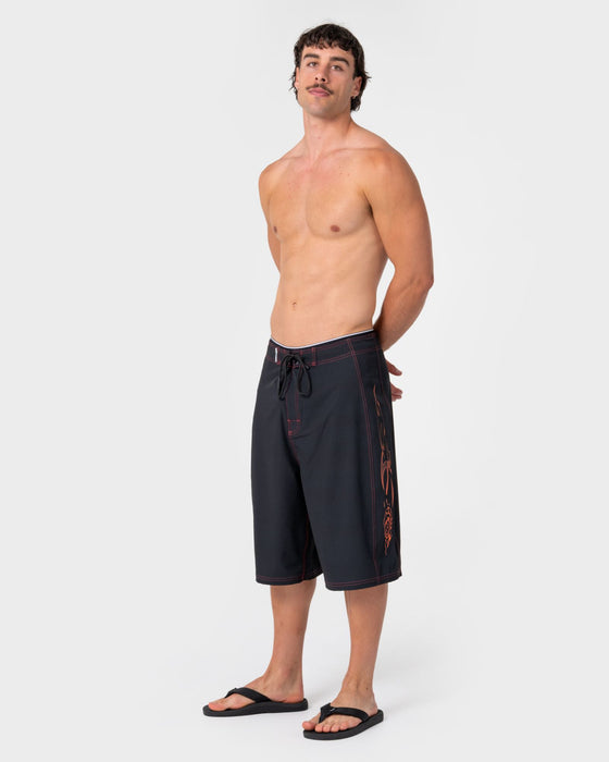 man-wearing-dragon-boosta-fixed-waist-boardshort-in-black