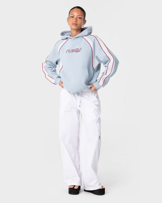 Woman wearing Tidal Wave Oversized Hooded Fleece in Retro Blue