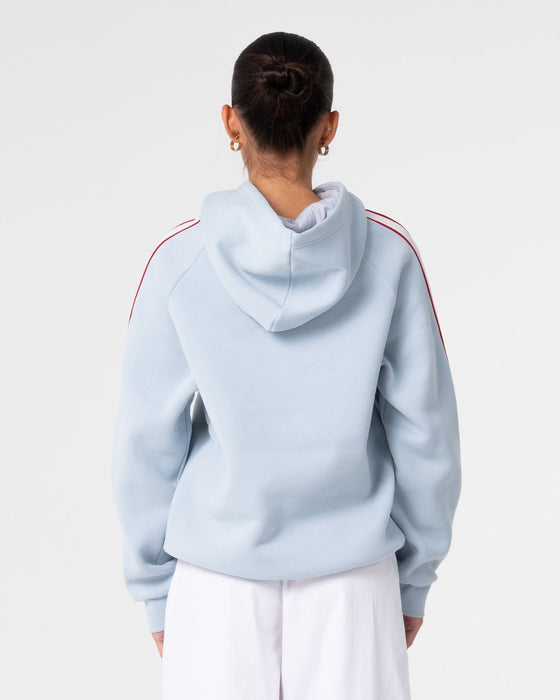 woman-wearing-tidal-wave-oversized-hooded-fleece-in-retro-blue