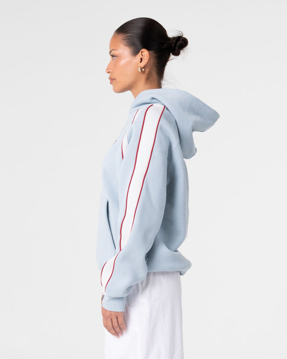 woman-wearing-tidal-wave-oversized-hooded-fleece-in-retro-blue
