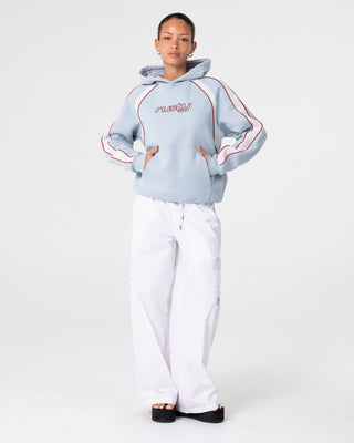 Woman wearing Tidal Wave Oversized Hooded Fleece in Retro Blue