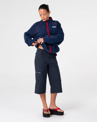 Woman wearing Bound Zip Through Fleece in Navy Blue