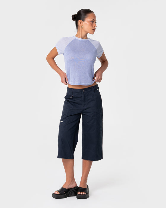 woman-wearing-it-gyrl-low-rise-capri-cargo-pant-in-navy-blue