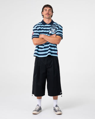 Man wearing Thrasha Short Sleeve Polo in Ice Blue