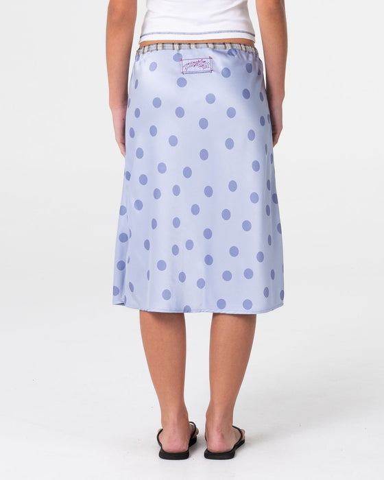 woman-wearing-claudi-low-rise-midi-skirt-in-cornflower-blue