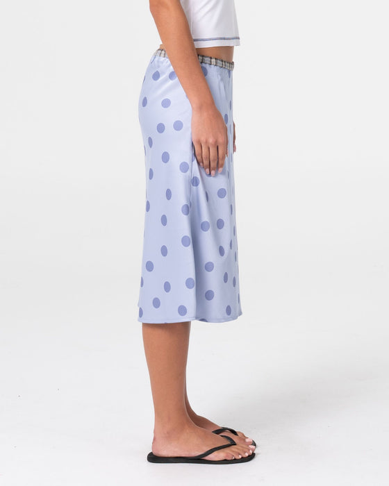 woman-wearing-claudi-low-rise-midi-skirt-in-cornflower-blue