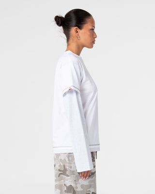 Woman wearing Lara Mock Long Sleeve Relaxed Tee in White