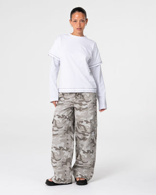 Woman wearing Lara Mock Long Sleeve Relaxed Tee in White