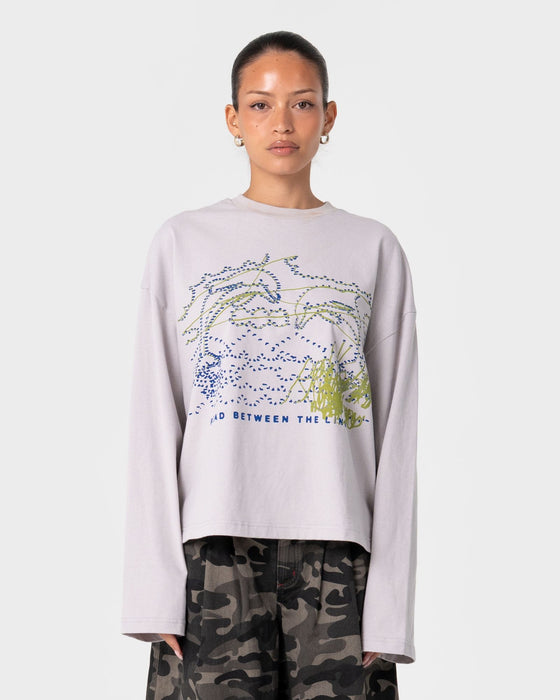 woman-wearing-coco-long-sleeve-relaxed-tee-in-oyster-grey