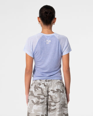 Woman wearing Teddy Raglan Baby Tee in Cornflower Blue