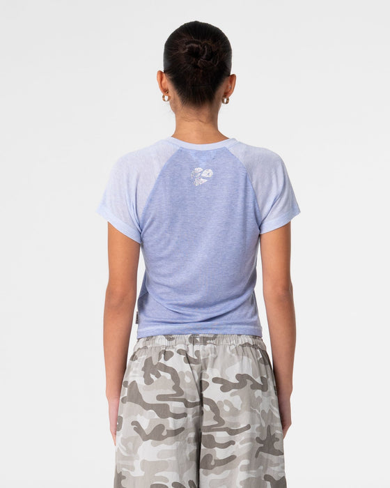 woman-wearing-teddy-raglan-baby-tee-in-cornflower-blue