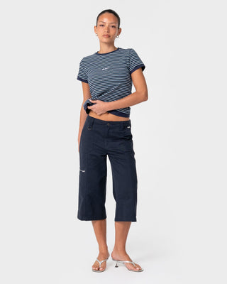 Woman wearing 18 Degrees Stripe Mock Layer Tee in Navy Blue