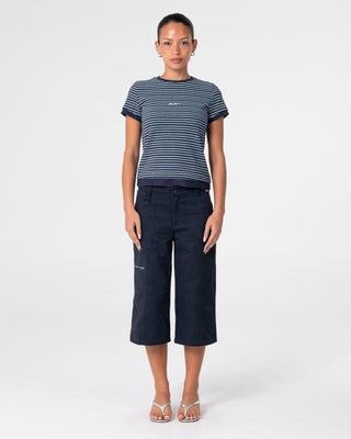Woman wearing 18 Degrees Stripe Mock Layer Tee in Navy Blue