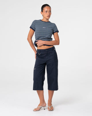 Woman wearing 18 Degrees Stripe Mock Layer Tee in Navy Blue