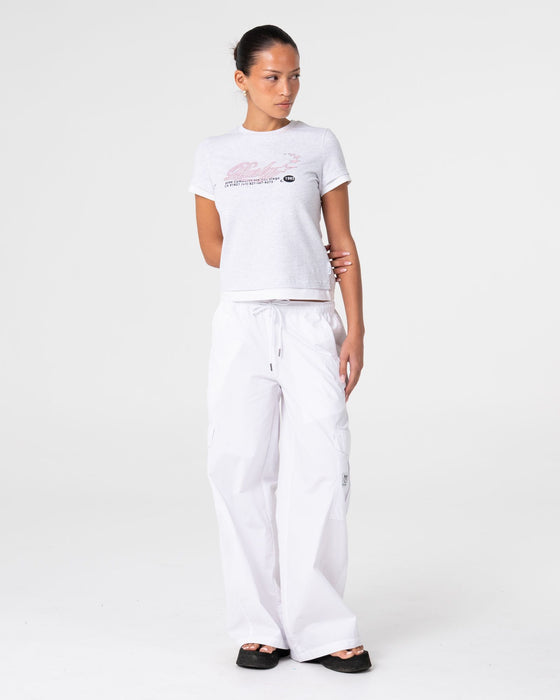 woman-wearing-star-seeker-mock-layer-tee-in-ecru-marle