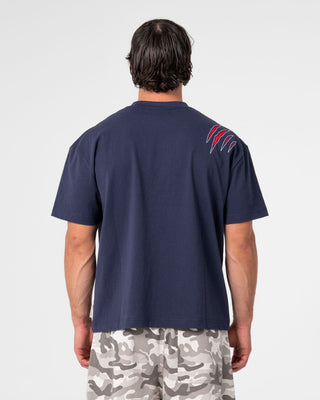 Man wearing Dragon Boosta Short Sleeve Tee in Dark Blue