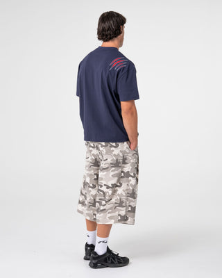 Man wearing Dragon Boosta Short Sleeve Tee in Dark Blue