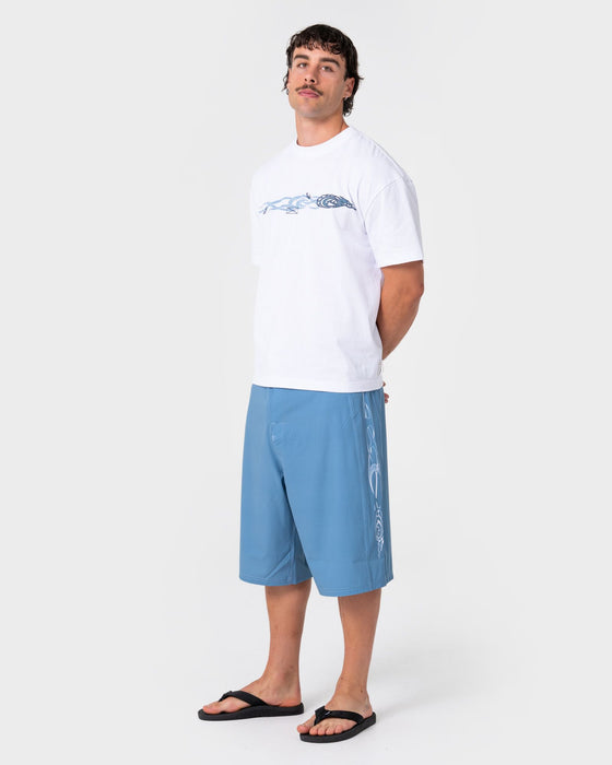 man-wearing-dragon-boosta-short-sleeve-tee-in-white