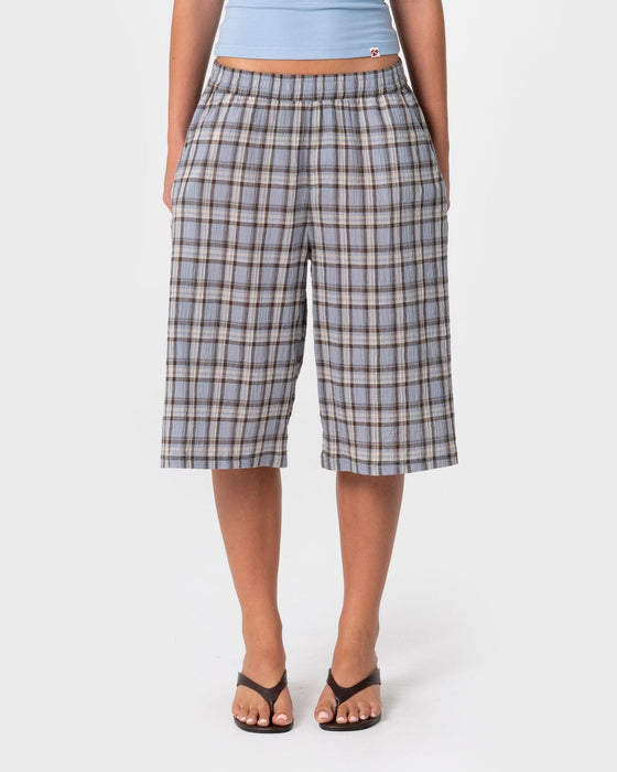 woman-wearing-mik-check-elastic-short-in-blue-check