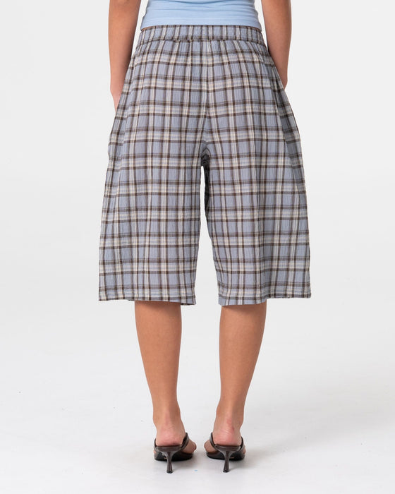 woman-wearing-mik-check-elastic-short-in-blue-check