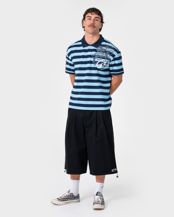 man-wearing-mamba-3-4-baggy-short-in-black