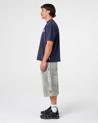 Man wearing Mystika Jort in Dirty Dawg