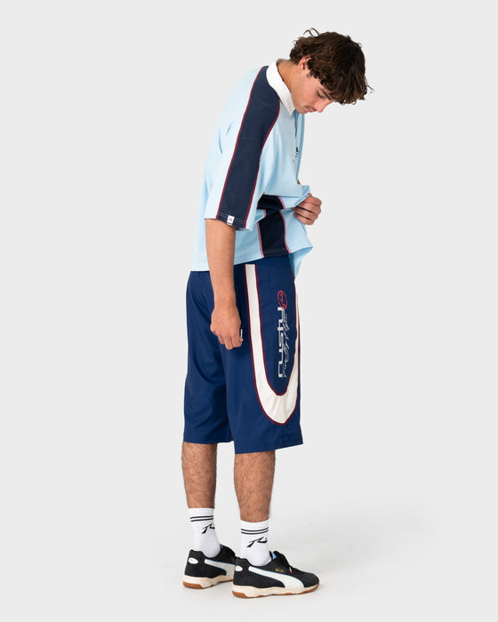 model-wearing-drop-in-fixed-waist-boardshort-in-navy-blue