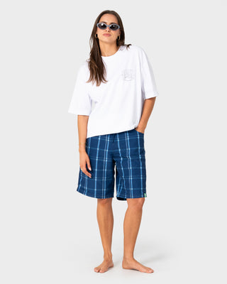 Model wearing Big Manu Elastic Waist Boardshort in Dark Blue