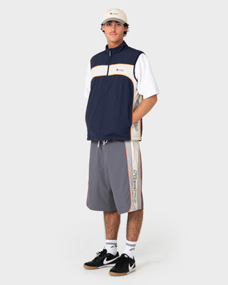 Man wearing Rusty x Halco Fleece Vest in Navy Blue