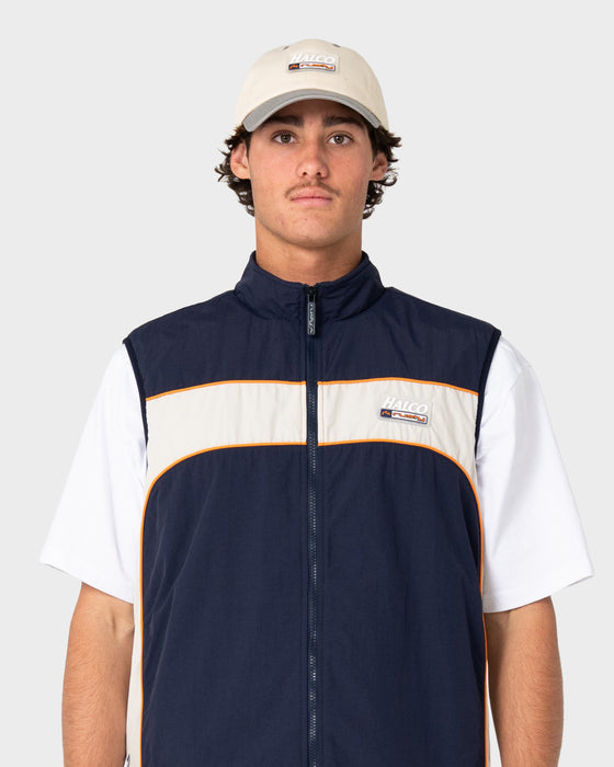 man-wearing-rusty-x-halco-fleece-vest-in-navy-blue