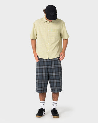 Model wearing HAL X Rusty Nylon 5 Panel Cap in Black