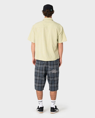 Model wearing HAL X Rusty Nylon 5 Panel Cap in Black