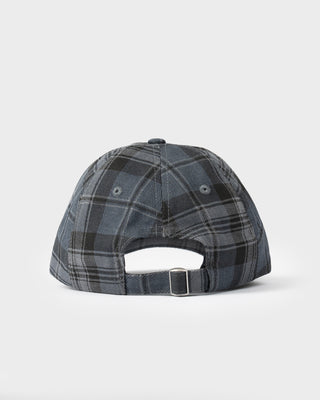 Model wearing HAL X Rusty 6 Panel Cap in Plaid