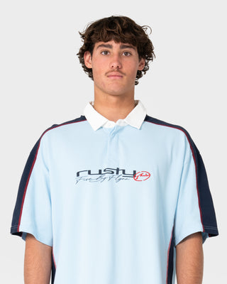 Model wearing Shooter Short Sleeve Rugby in Sky Blue