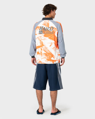 Man wearing Rusty x Halco Long Sleeve Fishing Polo in Orange