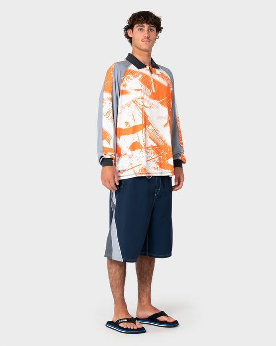 man-wearing-rusty-x-halco-long-sleeve-fishing-polo-in-orange