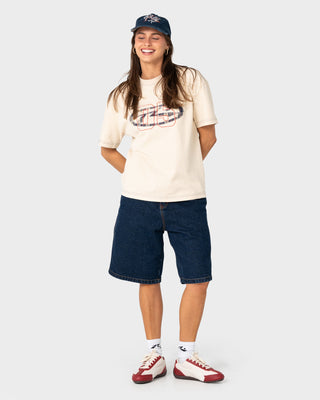 Model wearing Rusty X Five By Flynn Cap in Navy Blue